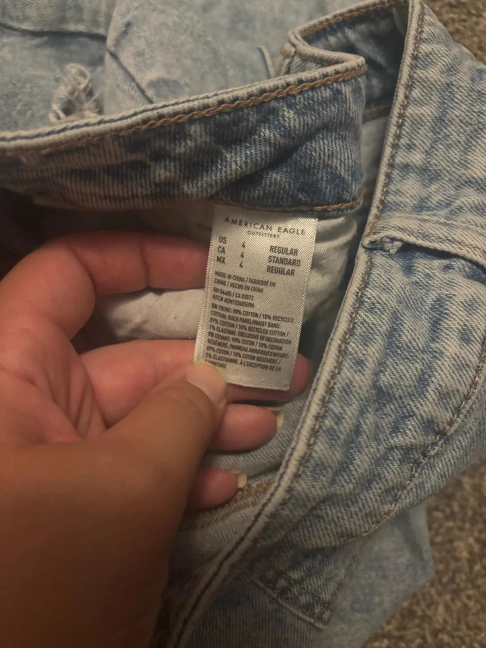 American Eagle Strigid light wash ripped denim mom jean, size 4